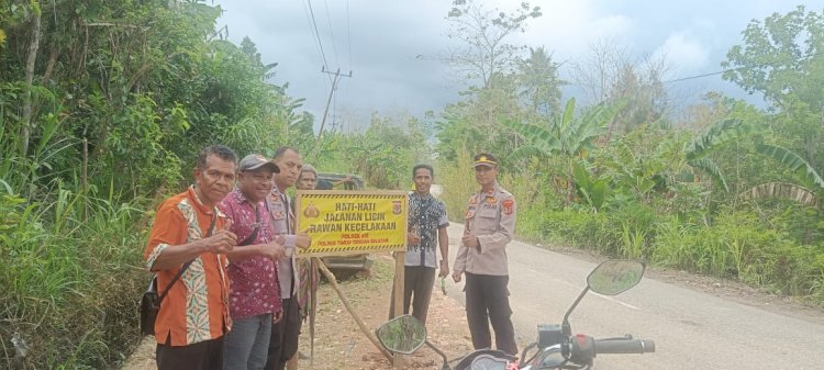 Pasang papan Imbauan Peringatan Rawan Longsor, Polsek Kie Ingatkan Pengunna Jalan Berhati-hati
