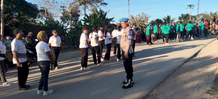 Semarakkan HUT RI ke-81, Polsek Kie Kawal Lomba Gerak Jalan di Desa Oenai